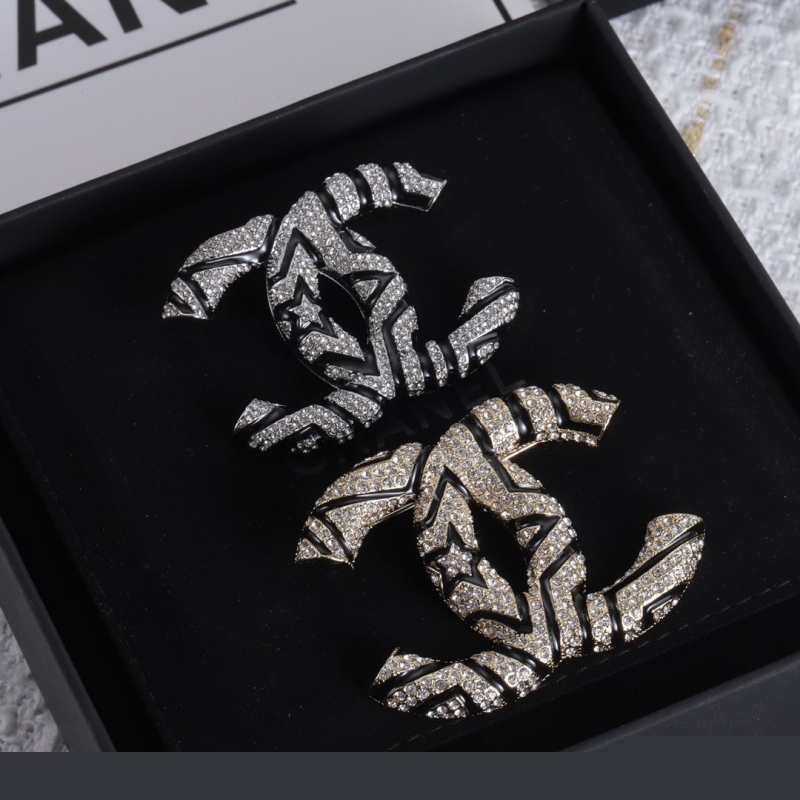 Ch*el brooches